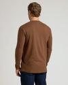 Man wearing Sepiawood Classic Long Sleeve Crew Neck, seen from behind.