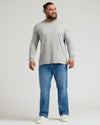 Man wearing Steel Classic Long Sleeve Crew Neck with jeans and sneakers.