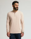 Model in Heather Camel Classic Long Sleeve Henley, showcasing a stylish, fitted design.