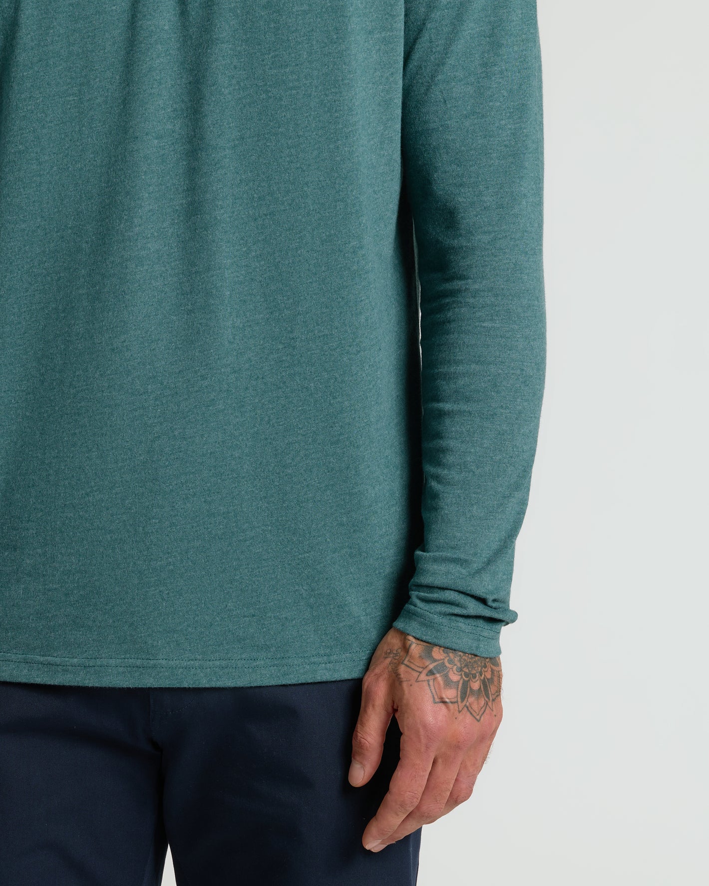 Heather Seafarer Classic Long Sleeve Henley, relaxed fit with geometric tattoo visible.