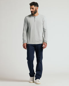 True ClassicMale model wearing Steel Classic Long Sleeve Henley, navy trousers, white sneakers.