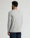 Man wearing Steel Classic Long Sleeve Henley, showcasing fitted back and neck tattoo.