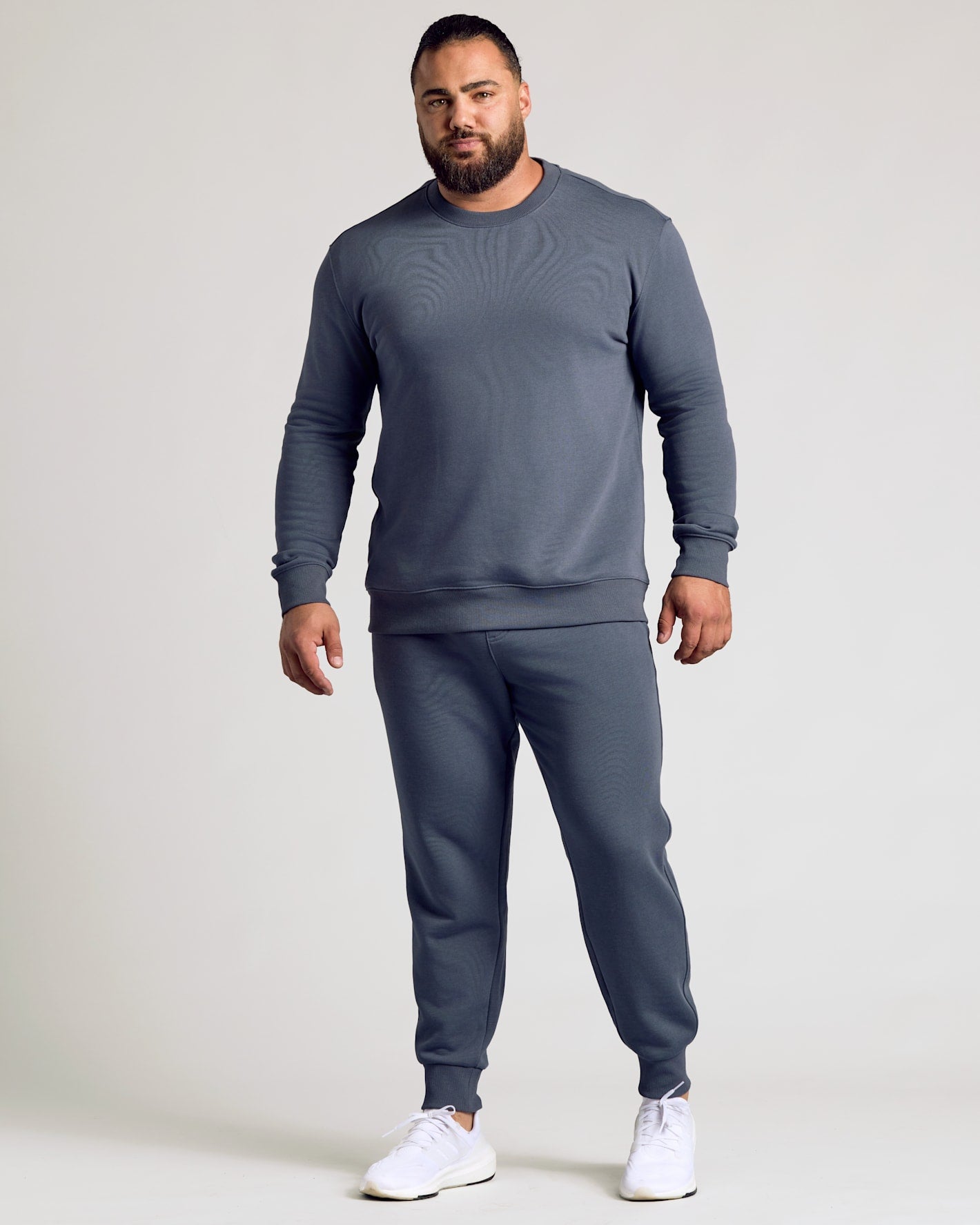 Stormy Fleece French Terry Pullover Crew Neck on man with relaxed pose.