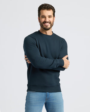 Man wearing the Navy Fleece French Terry Pullover Crew Neck.