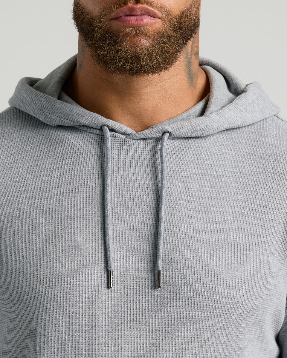 Man wearing Heather Gray Waffle Hoodie from Heather Gray & Navy Waffle Hoodie 2-Pack.