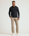 Man wearing All Black Long Sleeve Premium Pima Polo 3-Pack.