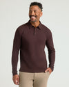Model in All Java Long Sleeve Premium Pima Polo, smiling confidently.