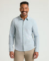 Juniper Stripe Classic Stretch Oxford 2.0 on smiling model in business casual attire.