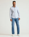 Man wearing Long Sleeve Stretch Oxford, showcasing relaxed fit and style.