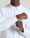 Person adjusting cuff of White Stretch Oxford 2.0 shirt.