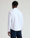 Back view of man in White Stretch Long Sleeve Modern Knit Oxford.