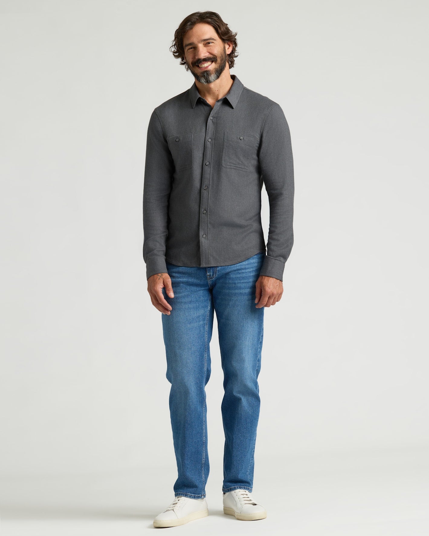 Man wearing Long Sleeve Flannel Shirts 3-Pack, dark gray shirt.