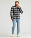 Model wearing Onyx Plaid & Slate Plaid Flannel Shirts 2-Pack.