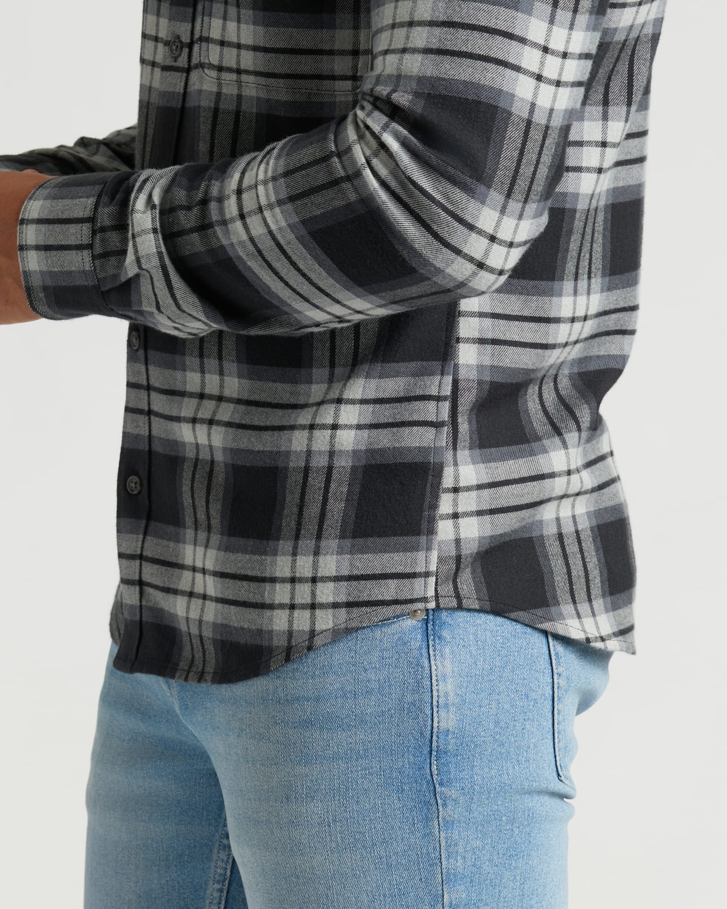 Onyx Plaid Long Sleeve Flannel Shirt, black-and-gray plaid, worn with jeans.