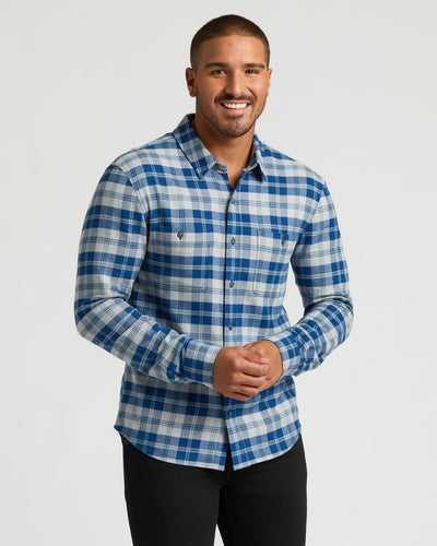 Man modeling Long Sleeve Flannel Shirts 3-Pack, blue plaid style.