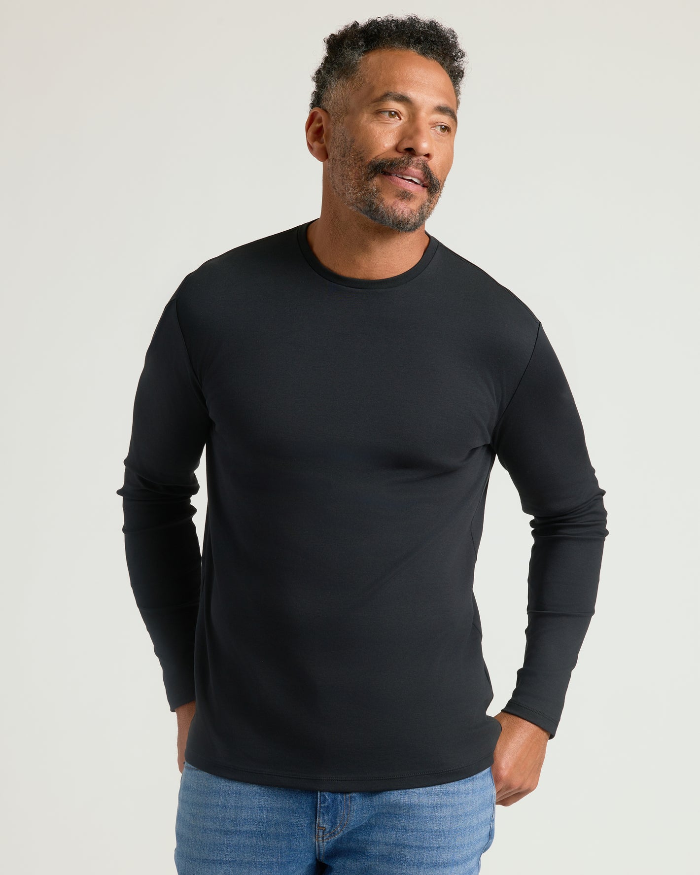 Man wearing Black & Carbon Premium Pima Long Sleeve Crew 2-Pack.