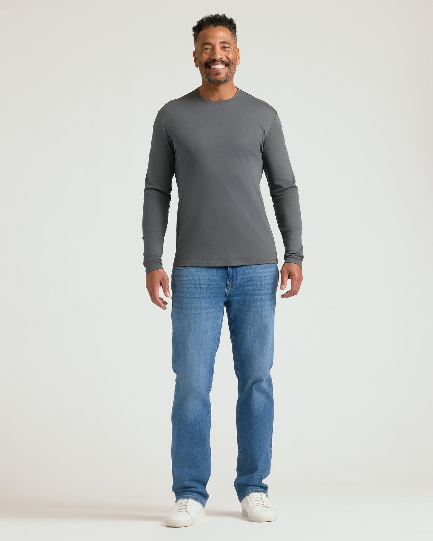 Carbon Premium Pima Long Sleeve Crew on man, fitted and stylish.