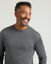 Man smiling in Premium Pima Long Sleeve Crew 7-Pack shirt.