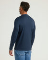 Back view of man in Navy Premium Pima Long Sleeve Crew.