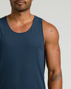 True ClassicMan models the All Navy Active Mesh Tank, showcasing tattoos.