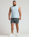 Man wearing Arctic Sleeveless Active Muscle Tee, showcasing athletic fit.