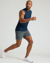 Man running in Dark Heather Navy Sleeveless Active Muscle Tee.