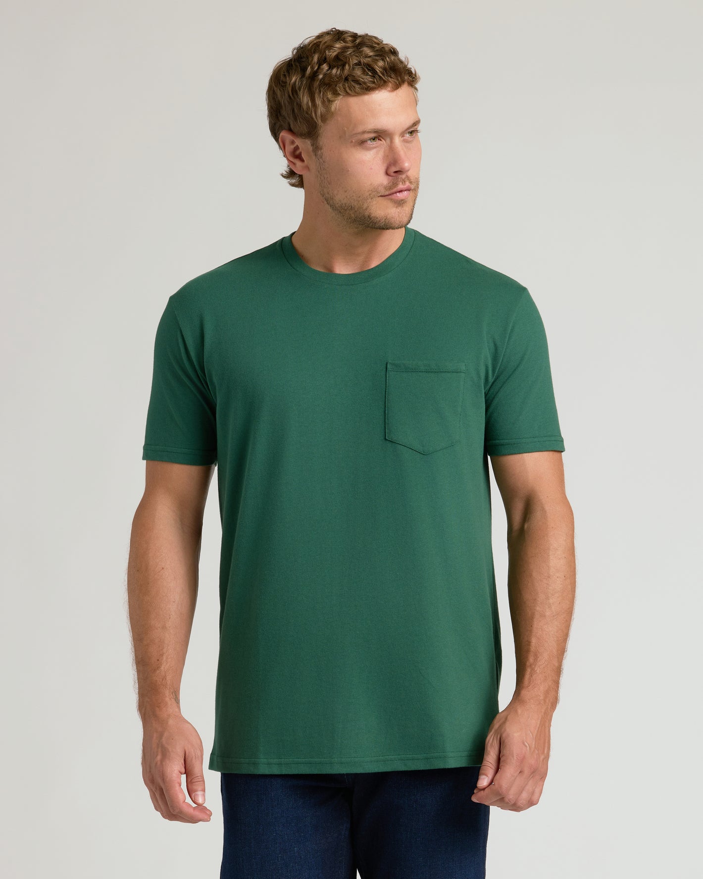 Man wearing Classic Pocket Crew 3-Pack T-shirt with patch pocket.