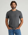 Model wearing Variety Heavyweight Pocket Shirts 9-Pack, featuring charcoal-gray T-shirt.