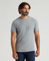 Heather Gray Heavyweight Pocket Crew on man with tattoos and jeans.