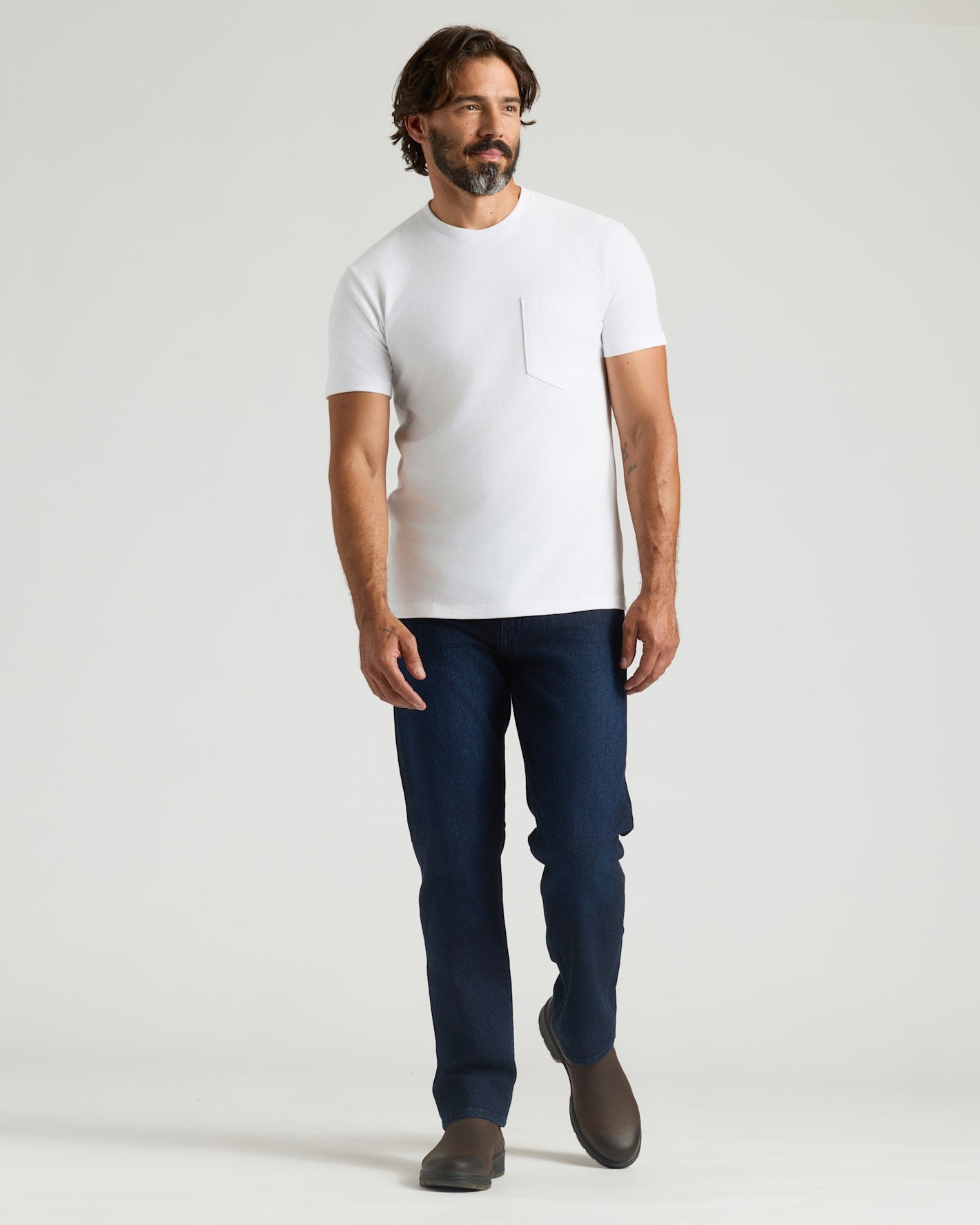 White Heavyweight Pocket Crew on casually dressed man, showcasing durable, structured style.