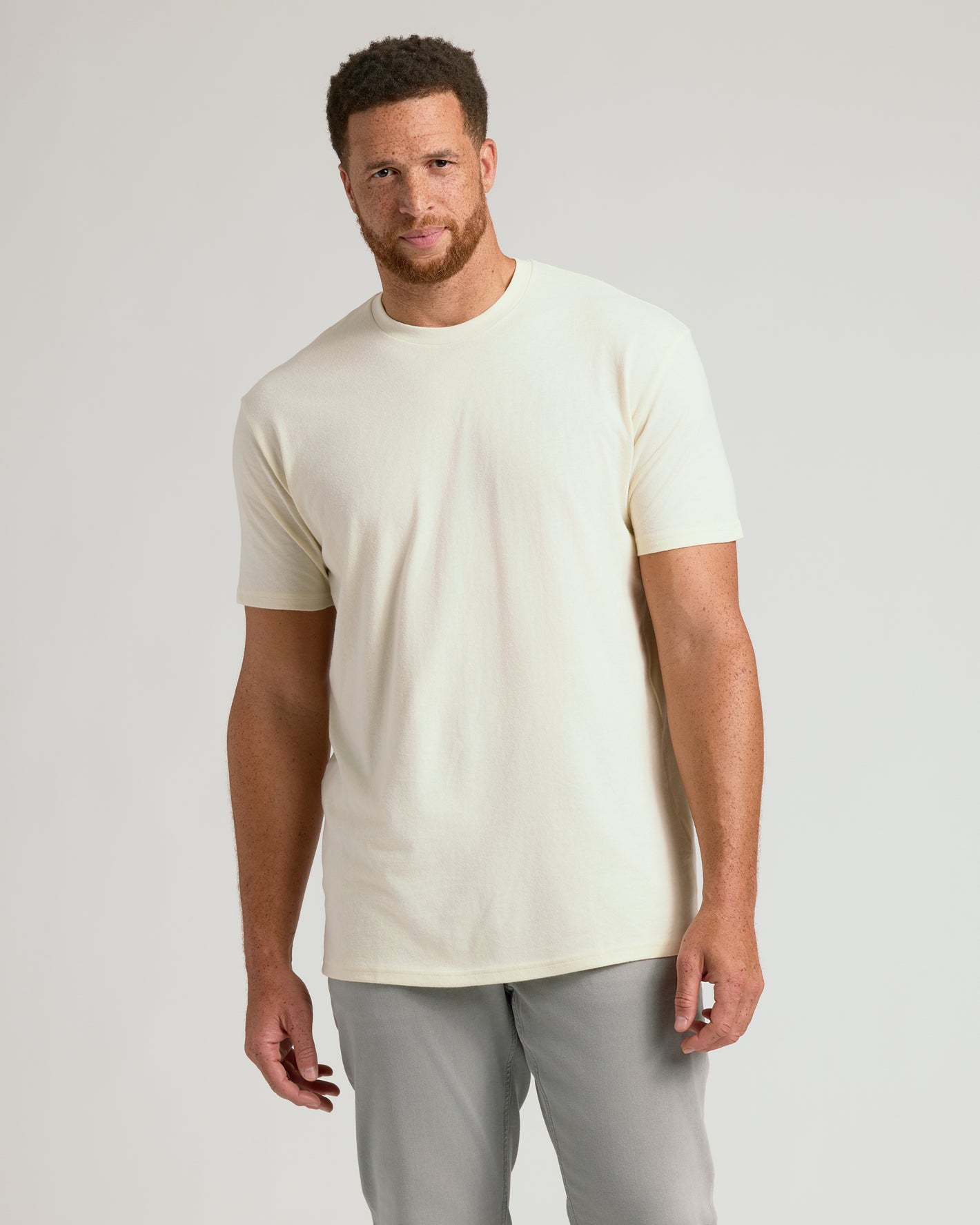 Man wearing Alabaster Tall Straight Hem Crew Neck T-Shirt.
