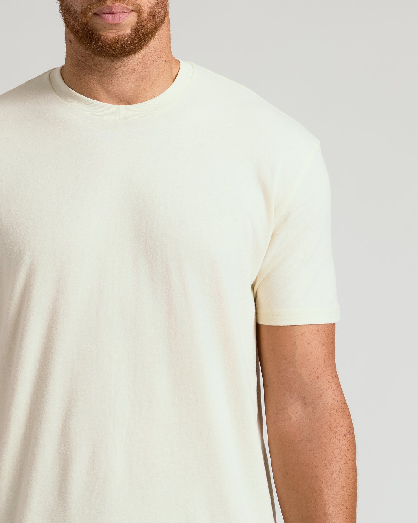 Alabaster Tall Straight Hem Crew Neck T-Shirt on man with reddish beard.