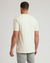 Man wearing Alabaster Tall Straight Hem Crew Neck T-Shirt, back view.