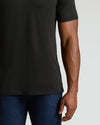 True Classic Men's Tall Straight Hem Crew Neck T-Shirt worn with jeans.