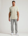 Man wearing Dark Heather Graystone Tall Straight Hem Crew Neck T-Shirt.