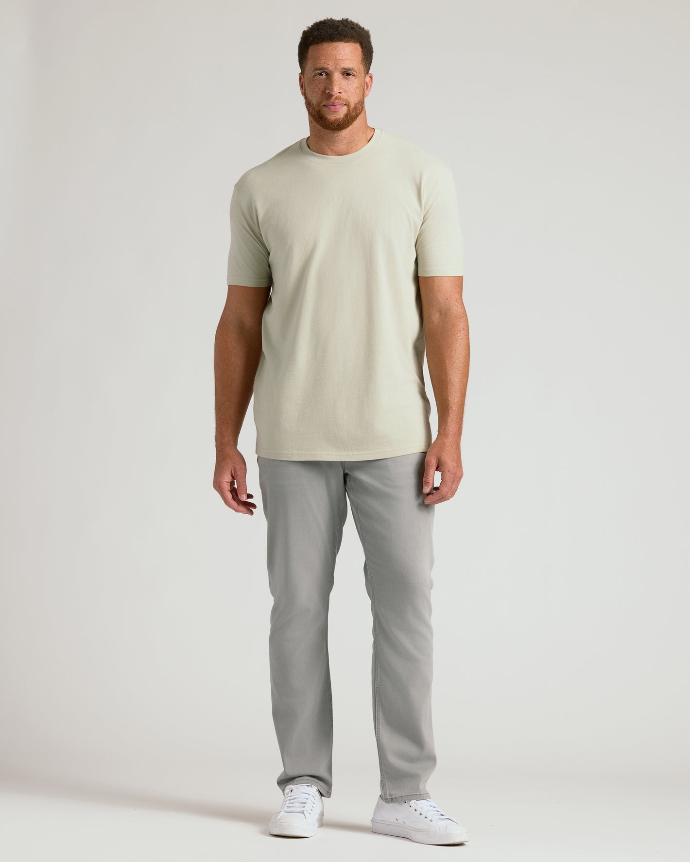 Man wearing Dark Heather Graystone Tall Straight Hem Crew Neck T-Shirt.