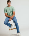 Heather Slate Green Tall Straight Hem Crew Neck T-Shirt worn seated.