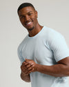 Icicle Tall Straight Hem Crew Neck T-Shirt on smiling man.