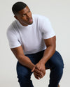 Wardrobe Straight Hem Crew Neck T-Shirt on seated man, relaxed pose.