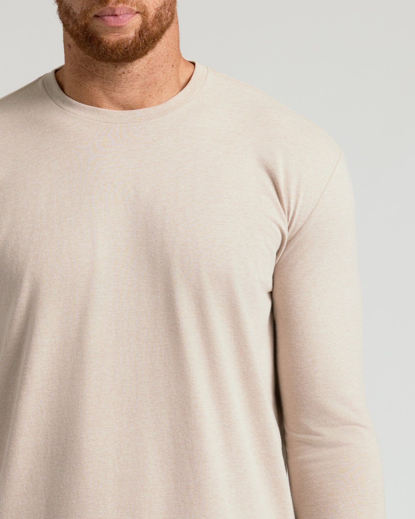 Heather Truffle Tall Long Sleeve T Shirt on man, showcasing neckline and sleeves.