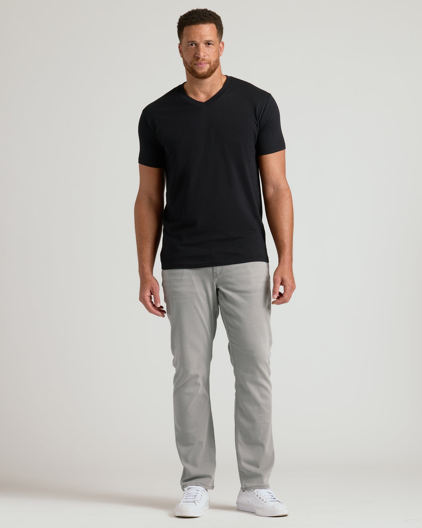 Wardrobe Classic Tall V-Neck 10-Pack on a man against a light background.