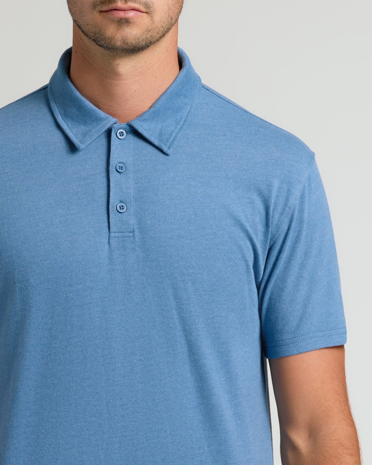 Dark Heather Blue Lake Short Sleeve Tall Polo with three-button placket and collar.