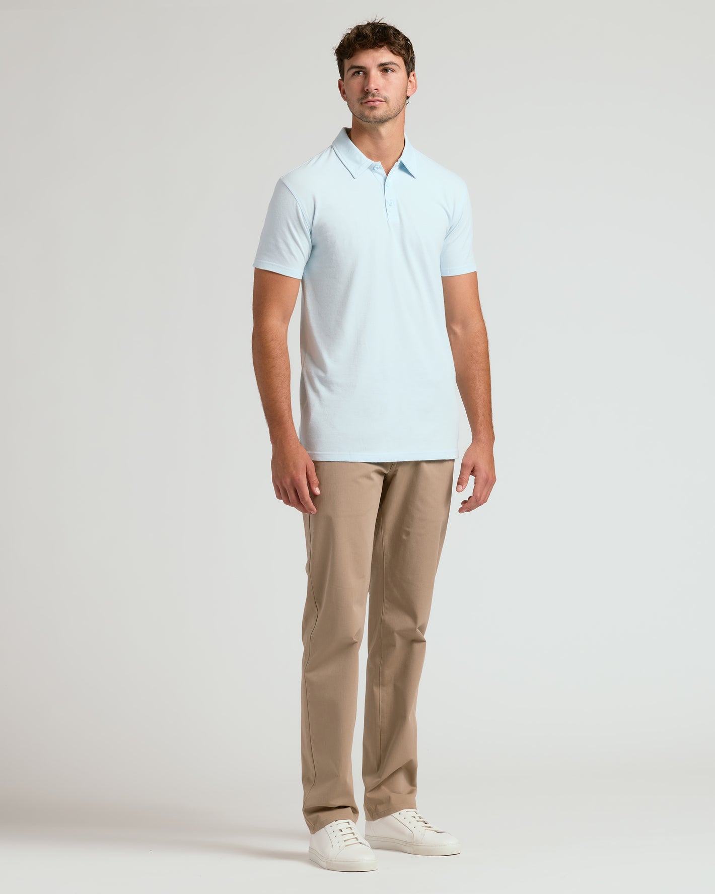 Icicle Short Sleeve Tall Polo worn by male model with khaki pants.