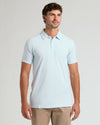 Man wearing Seasonal Tall Classic Polo, pale blue, with khaki pants.