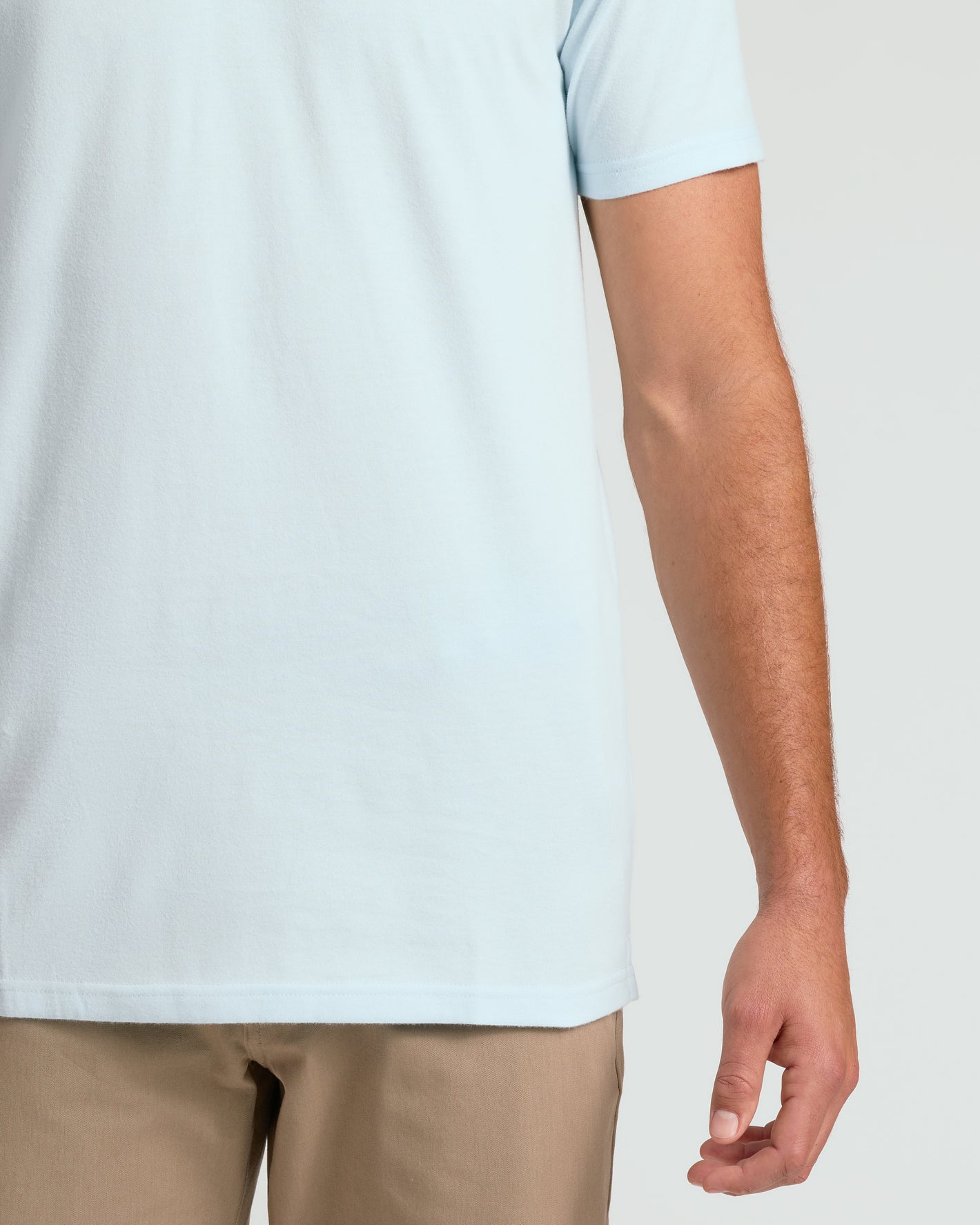 Icicle Short Sleeve Tall Polo on model's torso and arm.