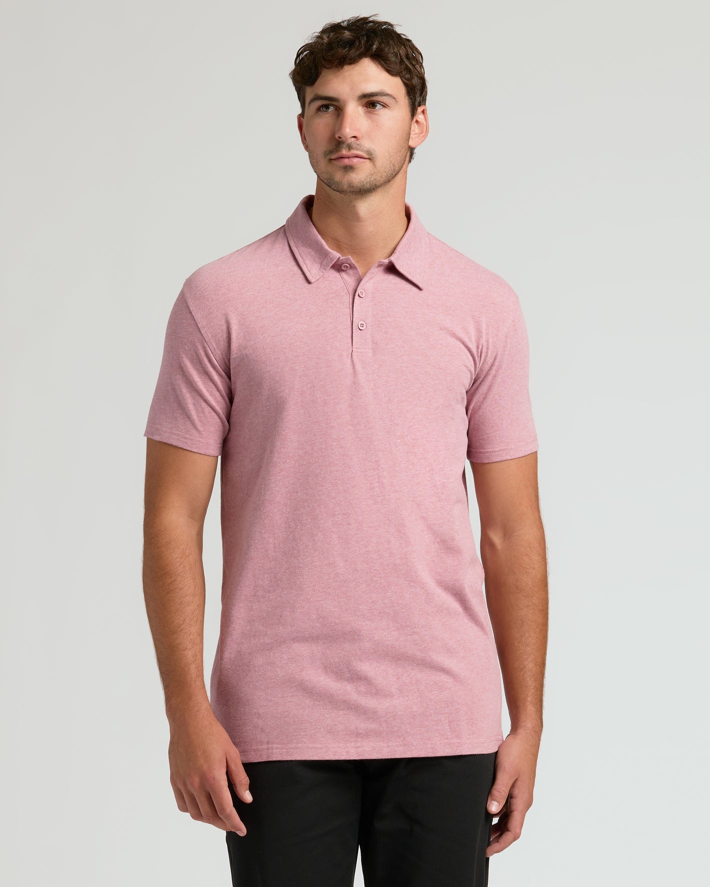 Light Heather Boysenberry Short Sleeve Tall Polo on male model.
