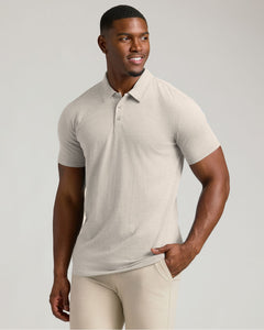 True ClassicMan in Seasonal Tall Classic Polo 3-Pack, oatmeal color, smiling.