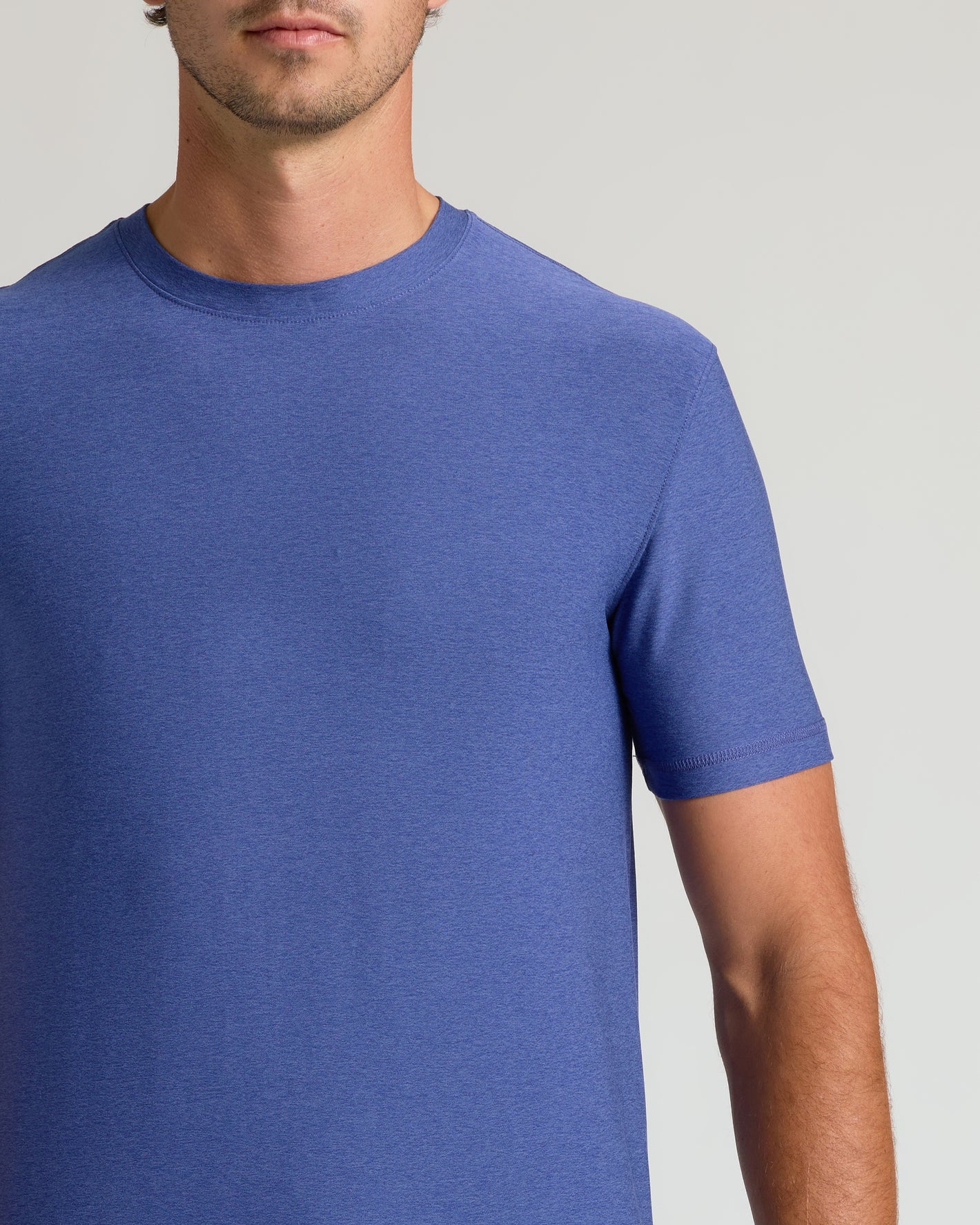 Cosmos Tall Active Crew Neck 2.0 on male torso, heathered blue.