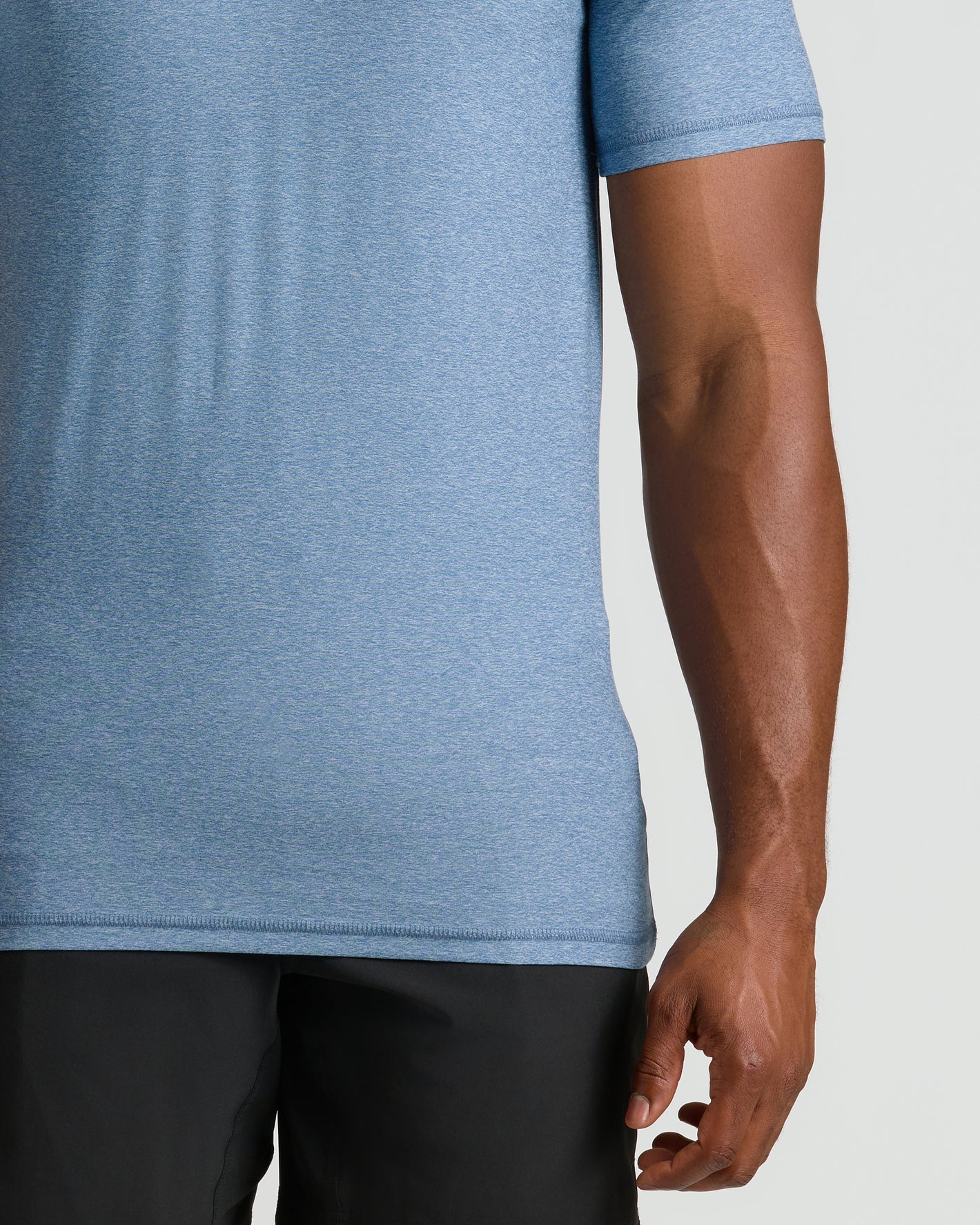 Heather Azul Tall Active Crew Neck 2.0 worn with black shorts.