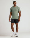 Heather Juniper Tall Active Crew Neck 2.0 on fit man, side pose.
